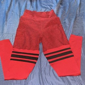 Bombshell red size small black strips on calf area